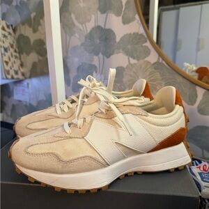 327 New Balance women’s sneakers.